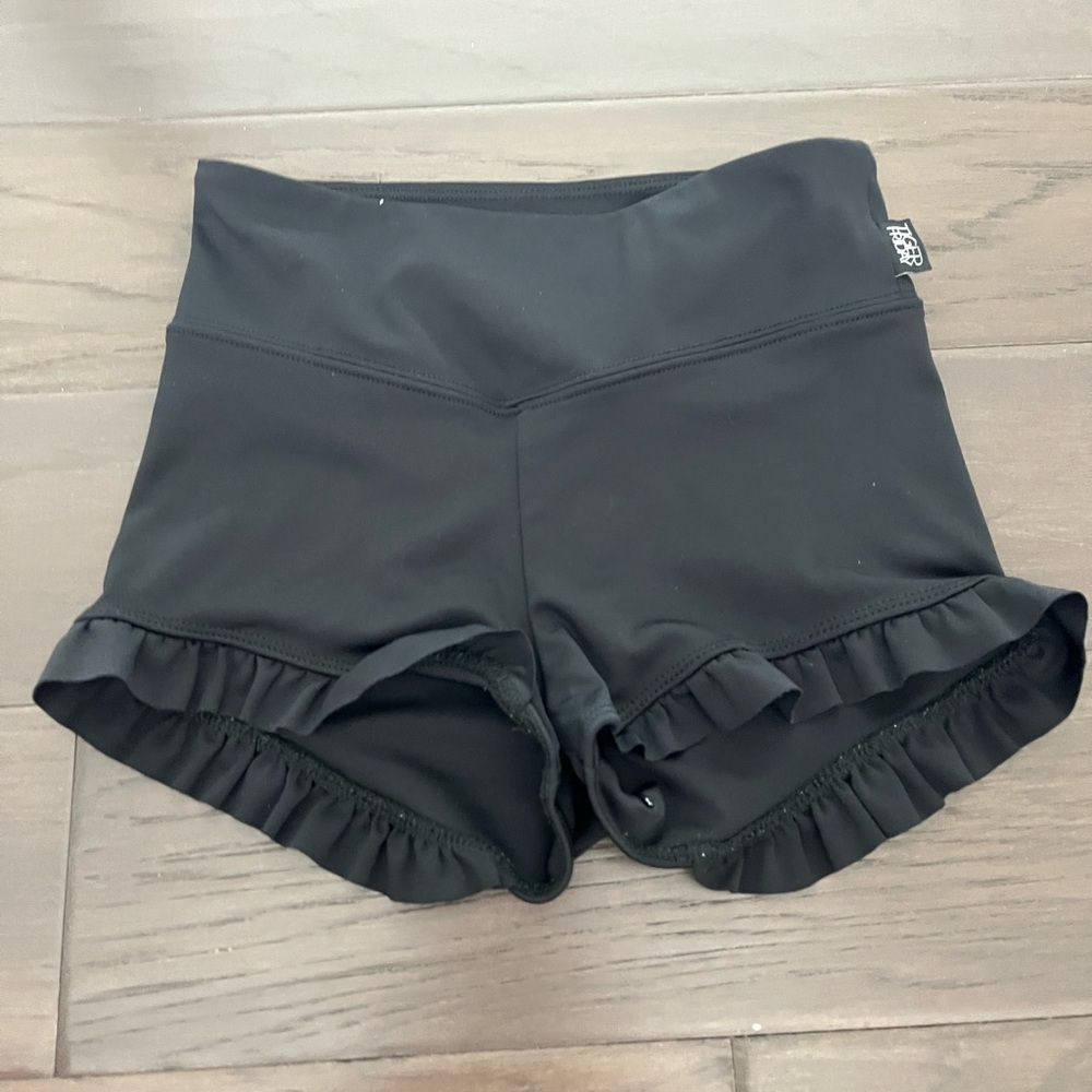 Elegant Black Athletic Shorts with Ruffle Hem